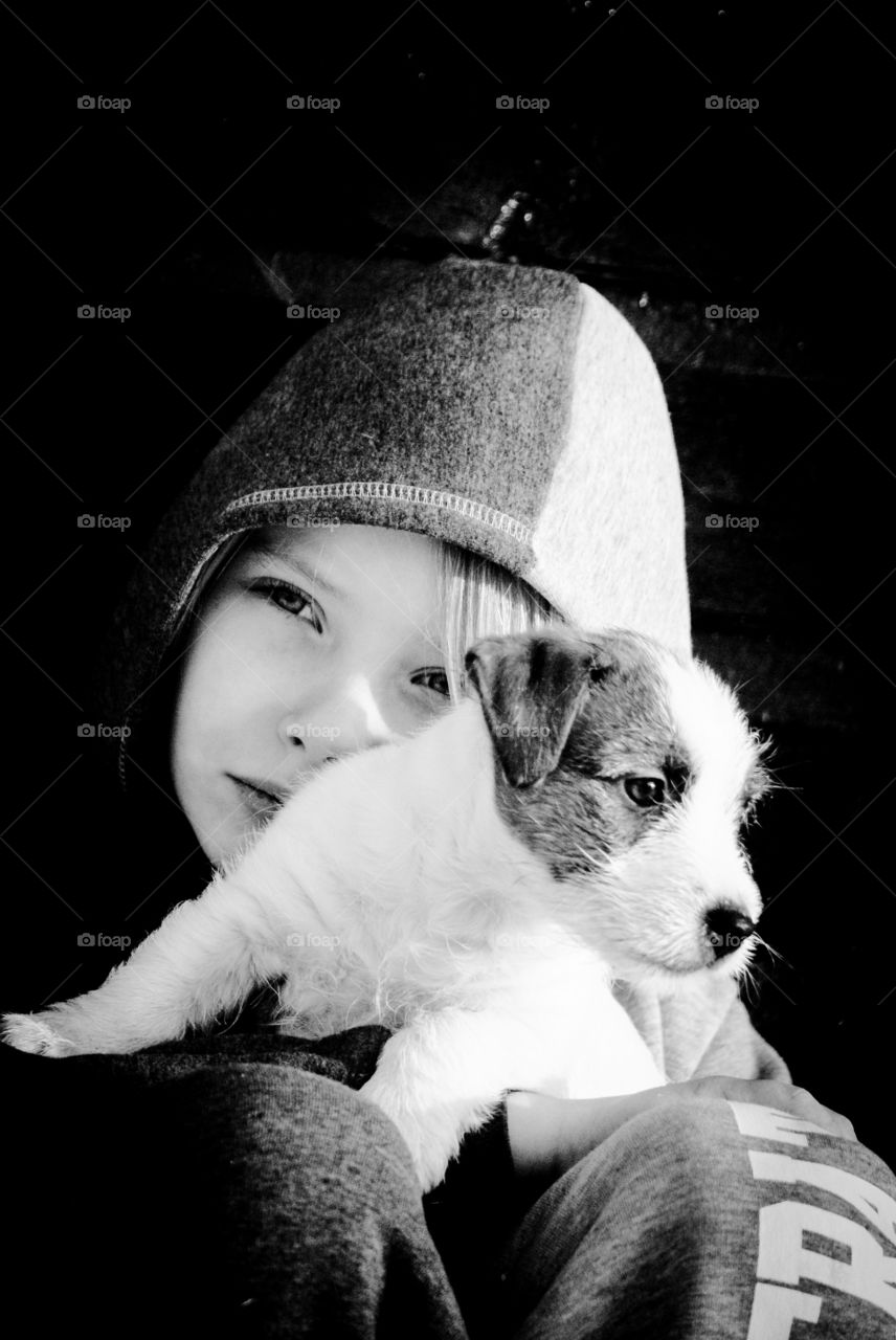 Dog and girl. A young girl with a puppy. 