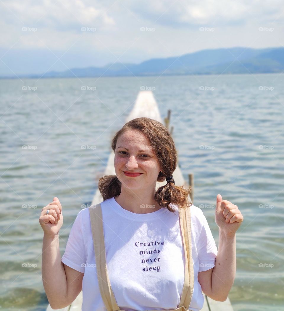 Natural woman around a lake