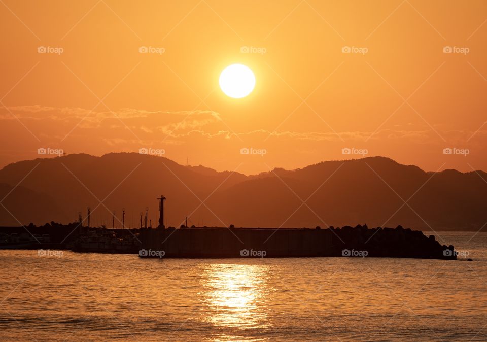 Beautiful sunrise scene at Enoshima beach Japan