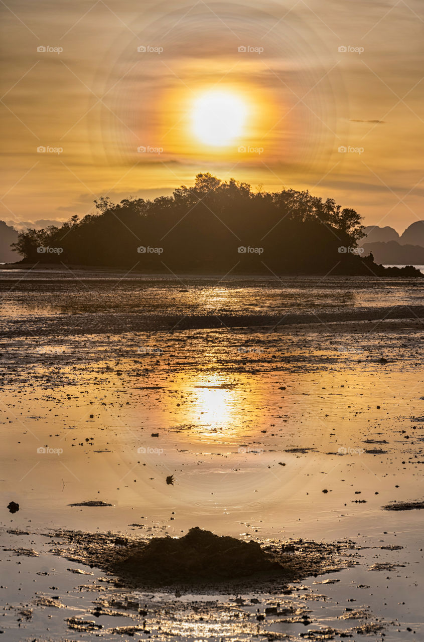 Sunrise above cute island