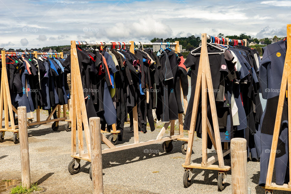 many wetsuits