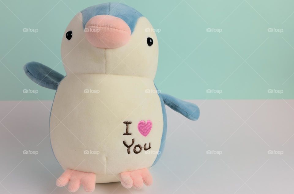 Stuffed penguin. Plush penguin doll.