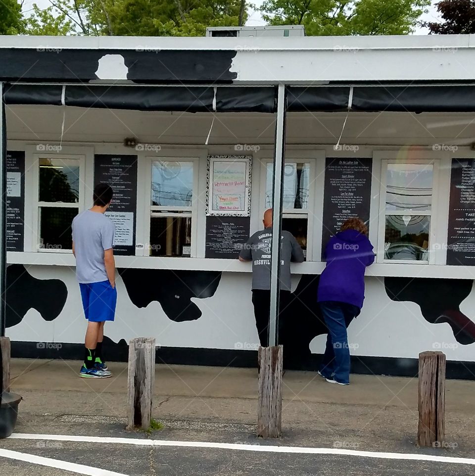 Cow painted icecream stand.