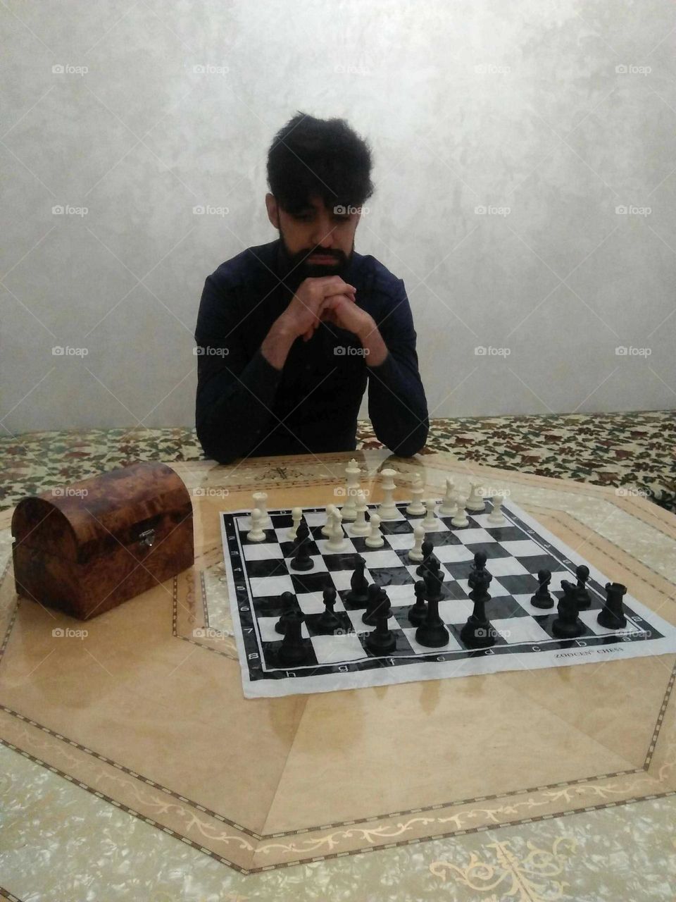 My eldest son plays chess.