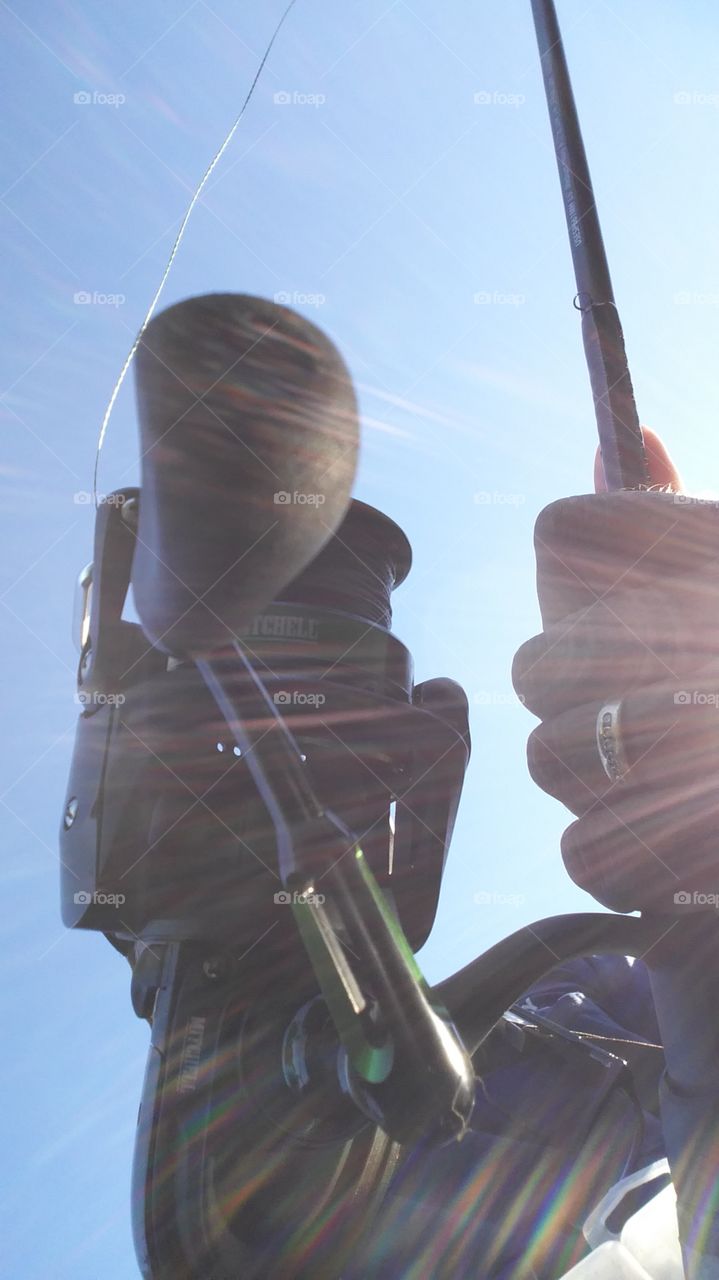 Fishing pole, sun beams