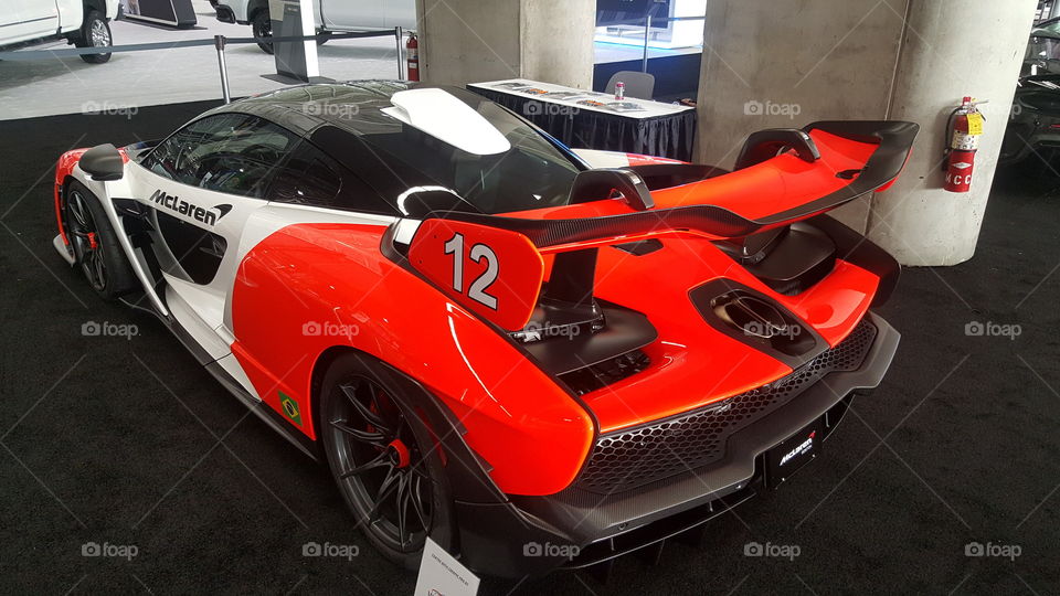 A new McLaren Senna wearing a retro racing paint job honoring race driver Ayrton Senna