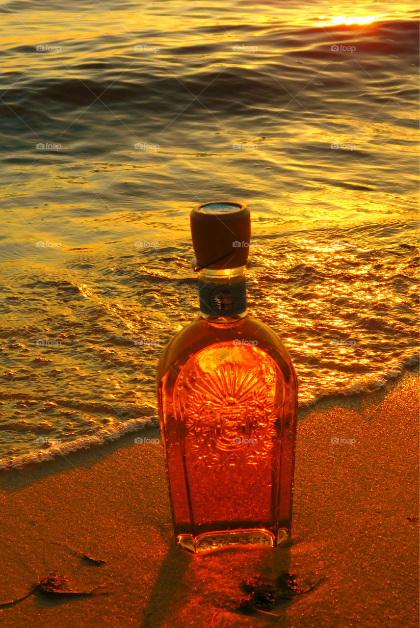 Sunset in a decorative bottle!
The sun was sinking behind the horizon, but left behind a magnificent sunset that cast its shimmering rays across the Choctawhatchee Bay