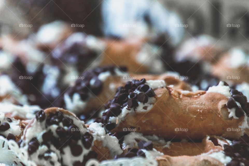 Plate of cannoli with chocolate chips