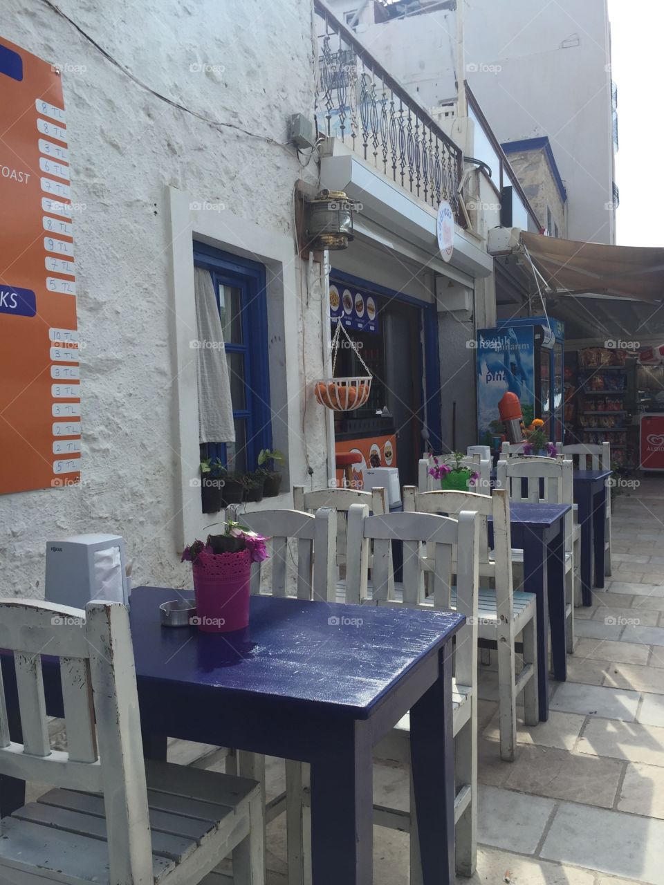 Mediterranean coffeeshop / restaurant with blue furniture