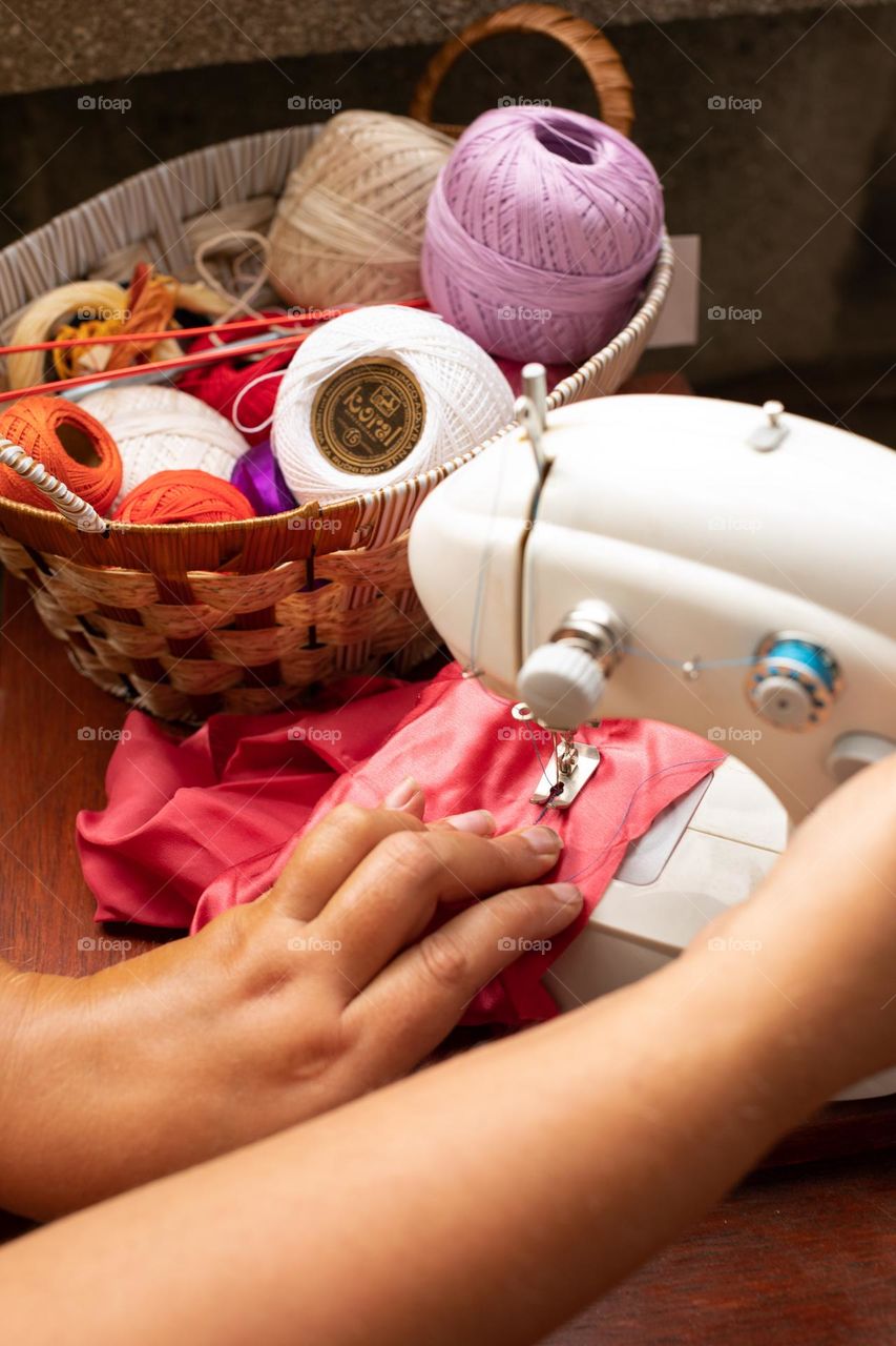 Working at the sewing machine