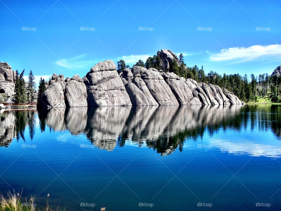 Rock reflection on lake