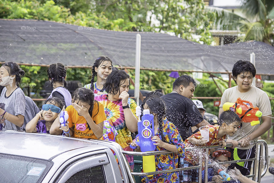 Tourists on the car play water in Songkran festival or Thai new year at Bang kruai, Nonthaburi , April 15, 2019