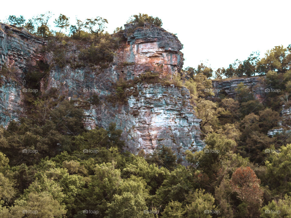 Signs of changing colors in early fall at bluffs on White River in Arkansas. 