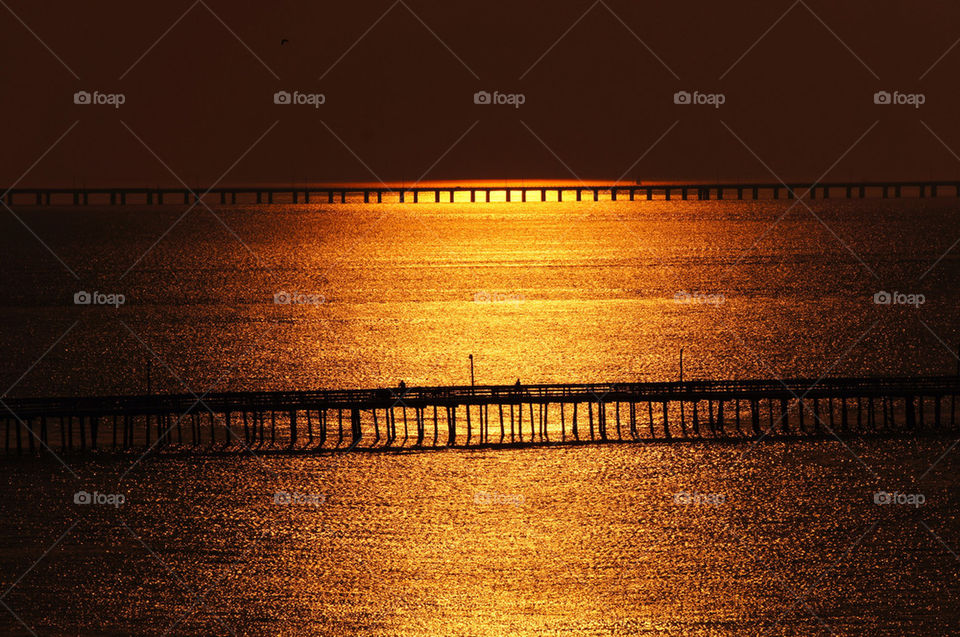ocean sunset reflection pier by sheltielover