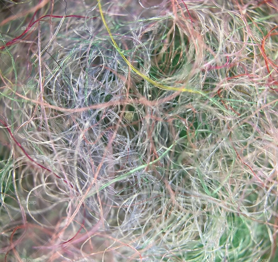 Multiple colors of Wool fibers after felting them all together into one creation