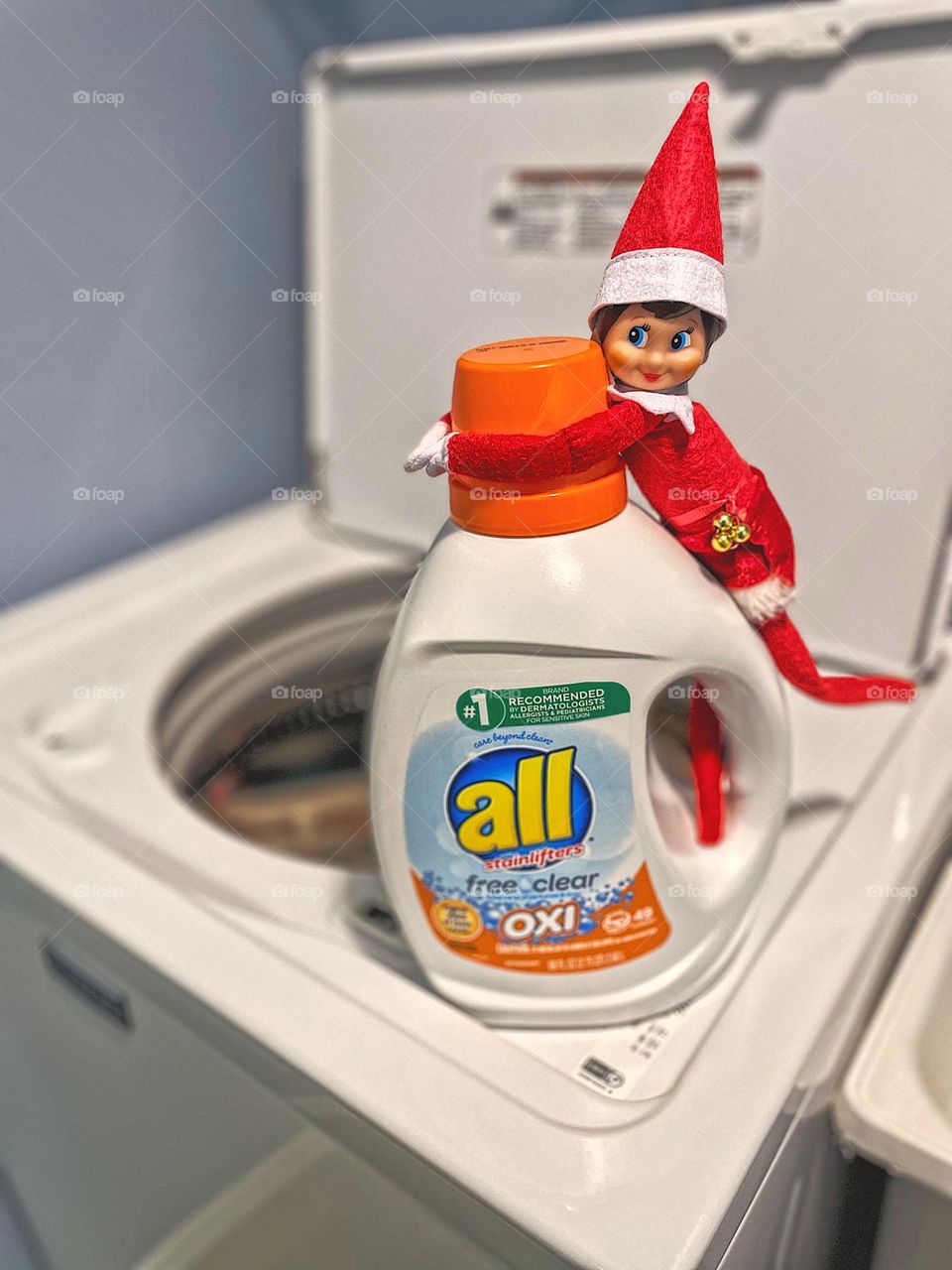 Elf on the shelf doing laundry, the elf is washing clothes, elf on the shelf antics, Christmas traditions, Christmas with children, enjoying the elf on the shelf tradition