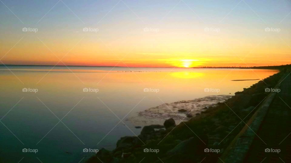 Sunset at Rogożnik Lake in Poland.