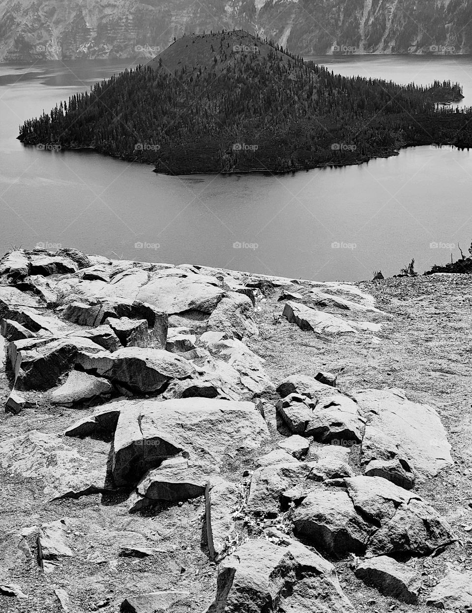 The rugged terrain of Crater Lake with a view of Wizard Island