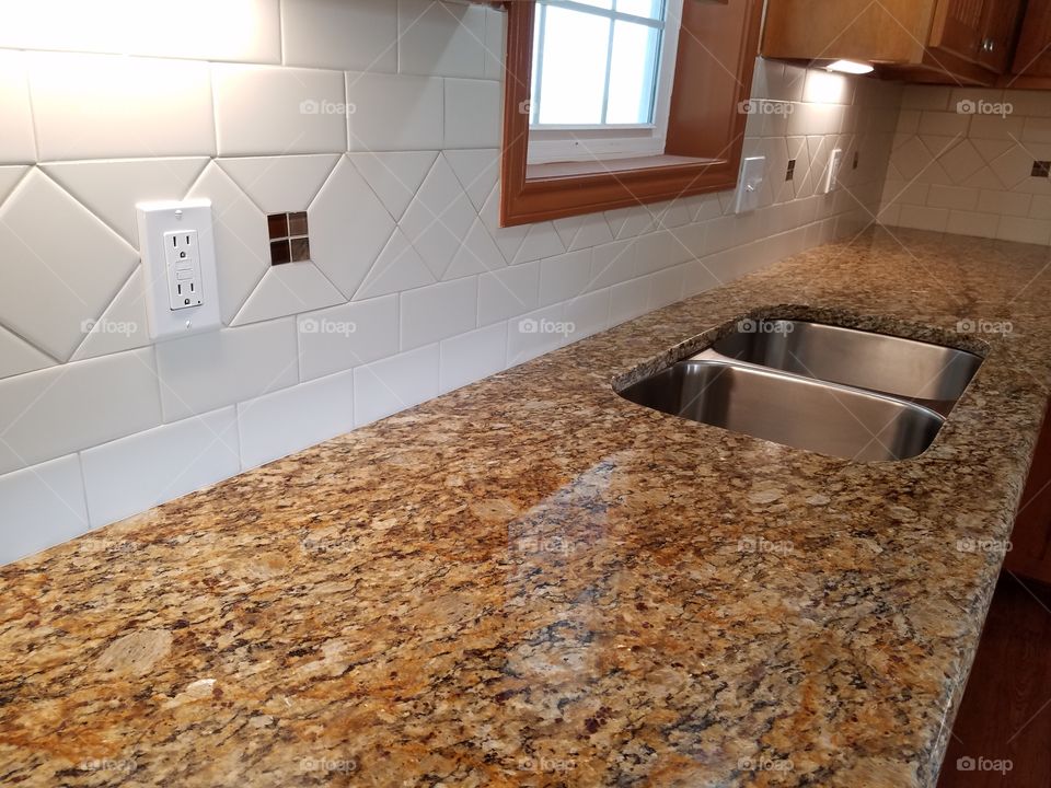 New Venitian Gold Granite Countertop with Tile Backsplash
