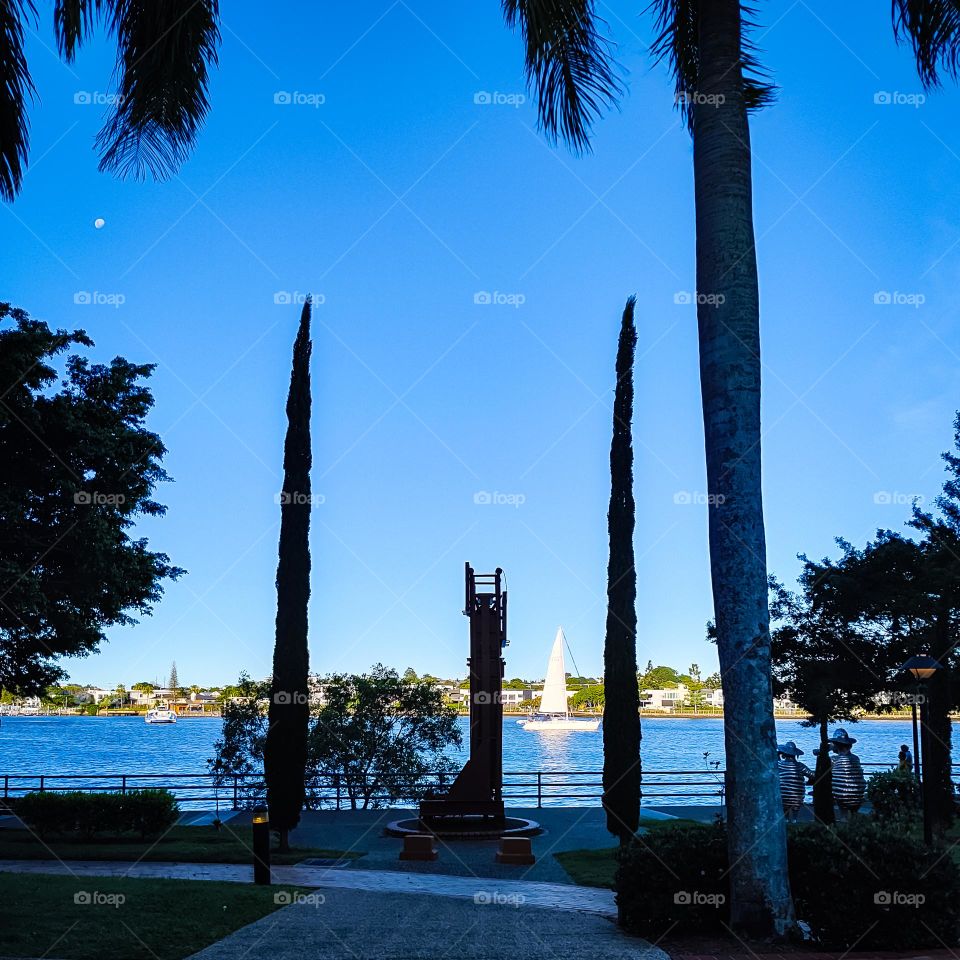 White sailing boat on sunny Brisbane river