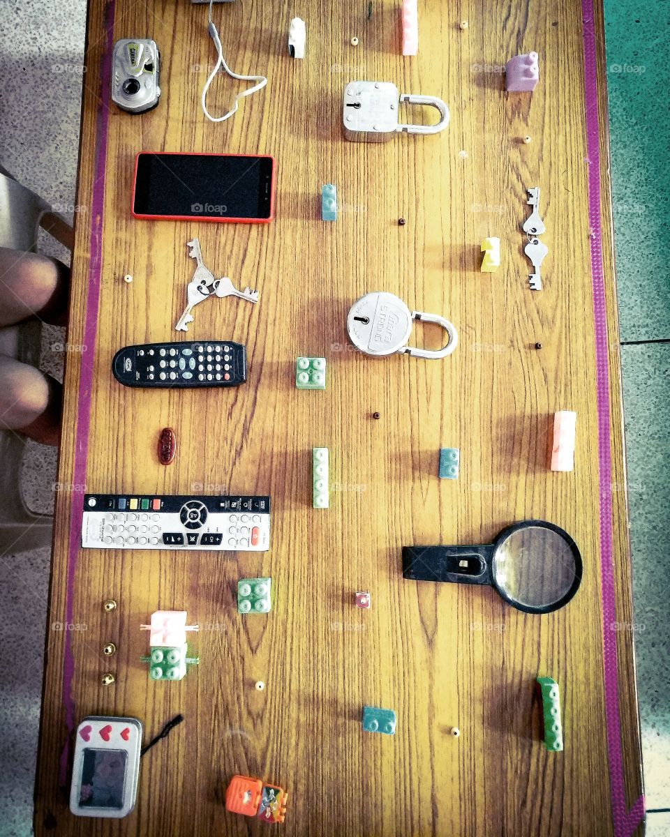 kid playing a game " space craft control panel "