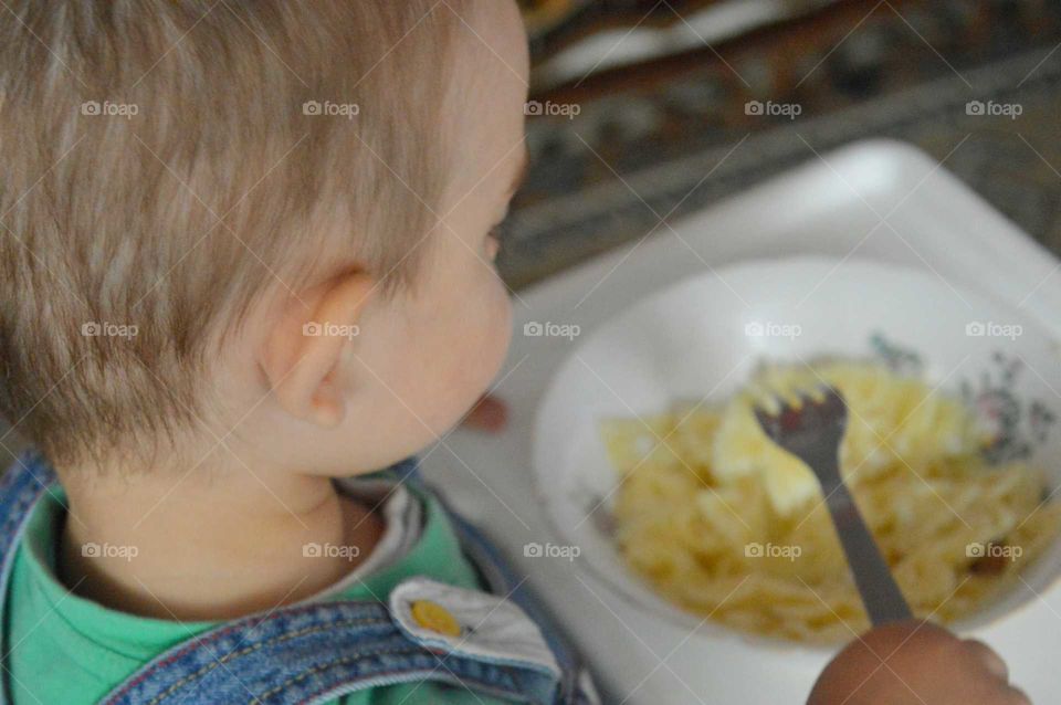 boy eating dinner