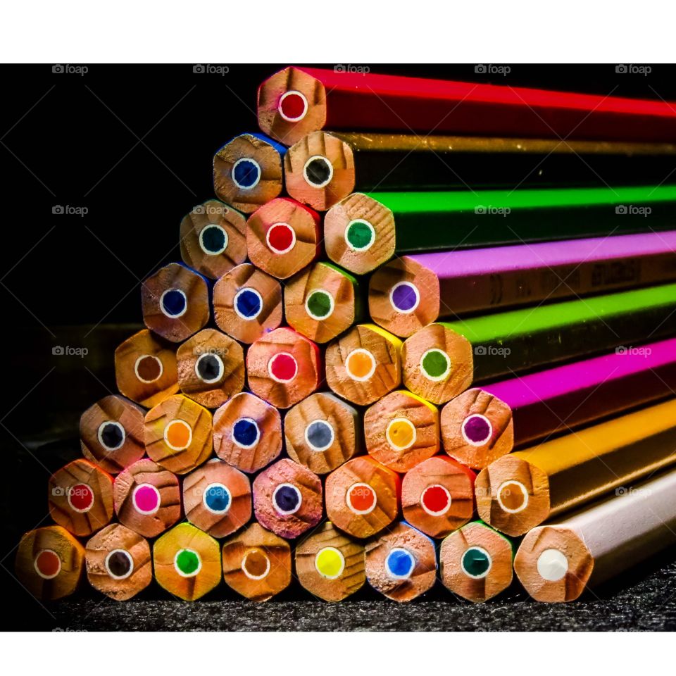 Triangle of colored pencils