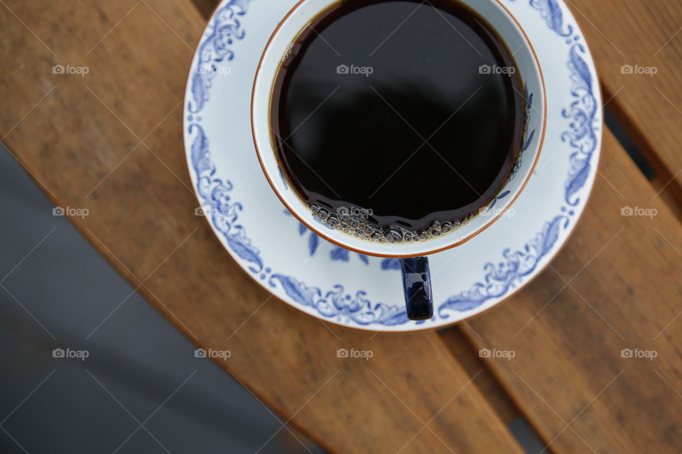 Cup of coffee on outdoor table