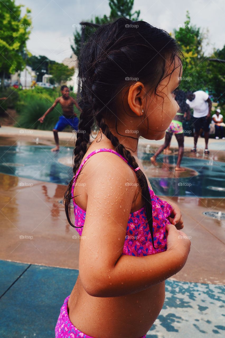 Close-up of a cute girl wearing swimsuit