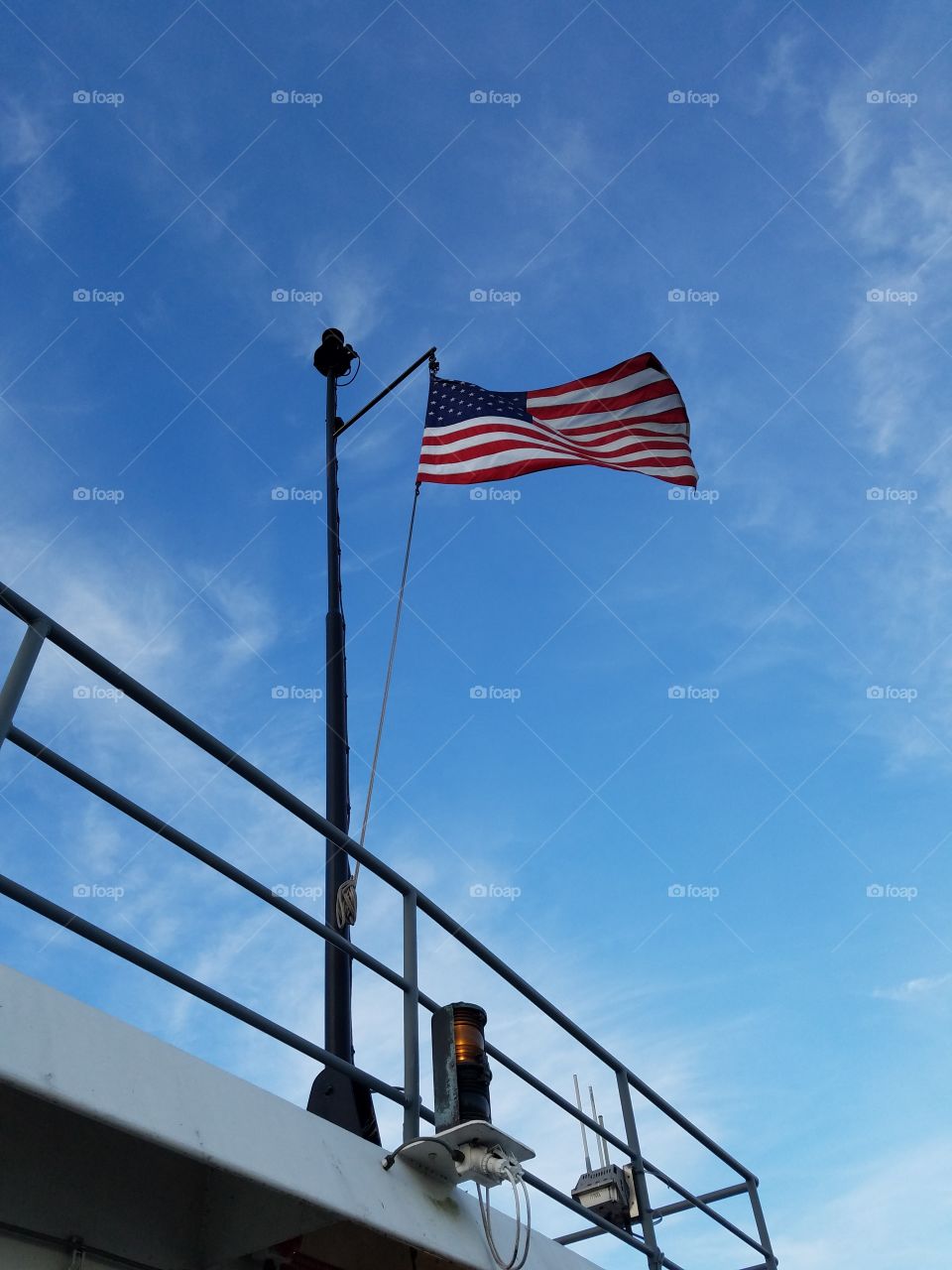 American flag on the mast of a boat