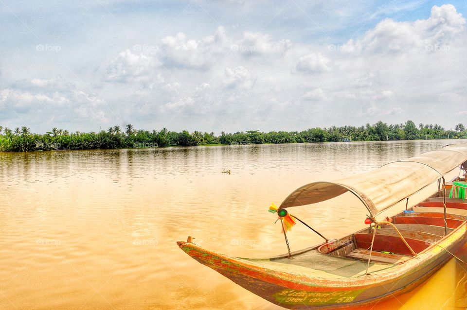 Thai local boat in Bangpakong River, Thailand.