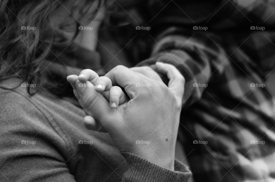 Holding Hands. Mother and son holding hands. 