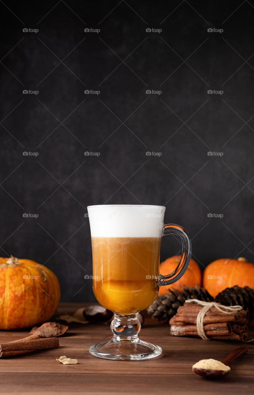 pumpkin latte on dark background