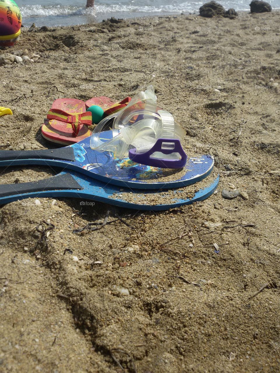 Beach rackets on the sand