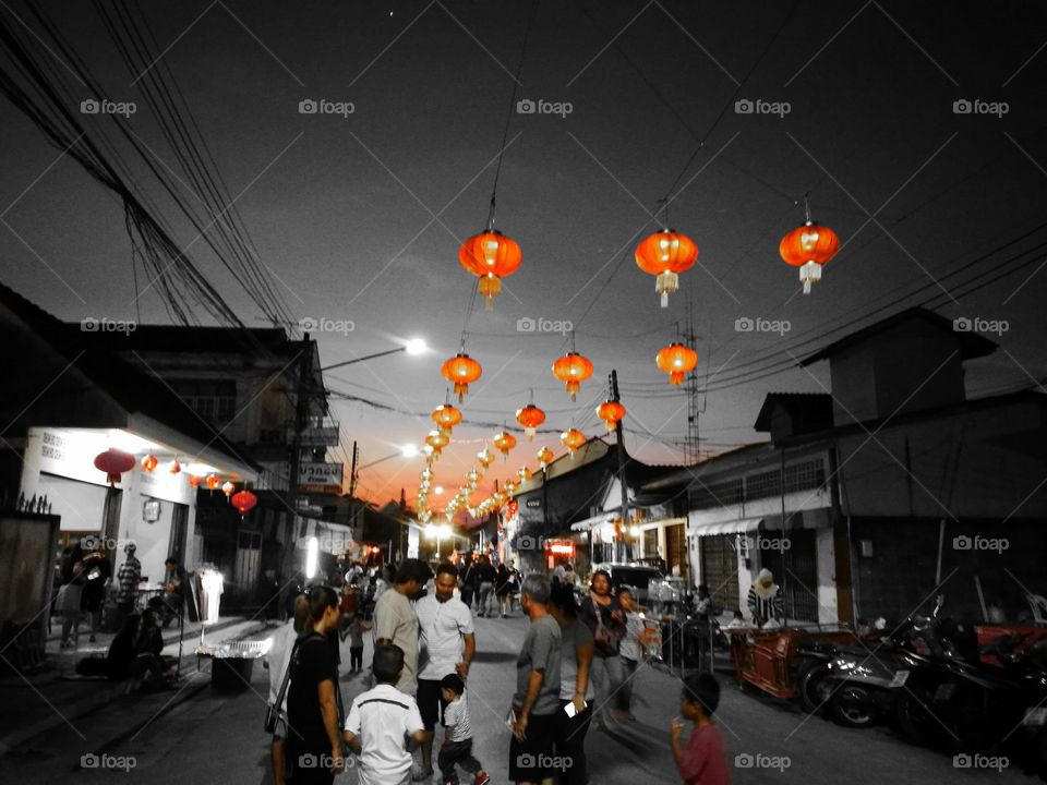 Group of people standing in street