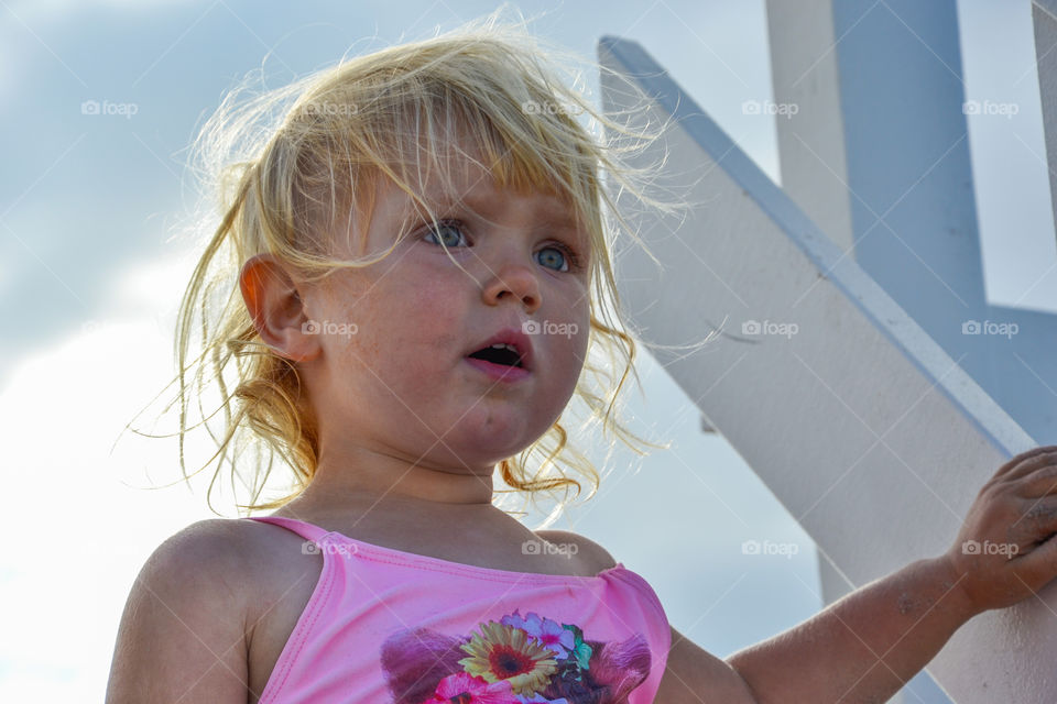 Little girl on Ribban beach in Malmö Sweden.