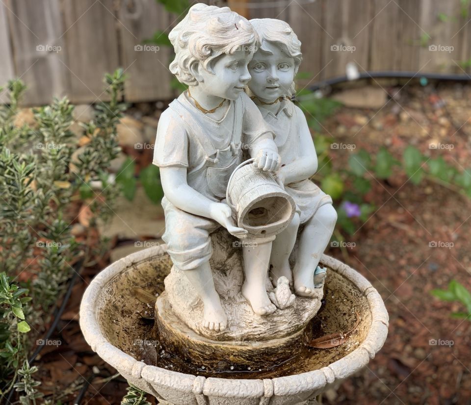 Boy and girls water fountain 