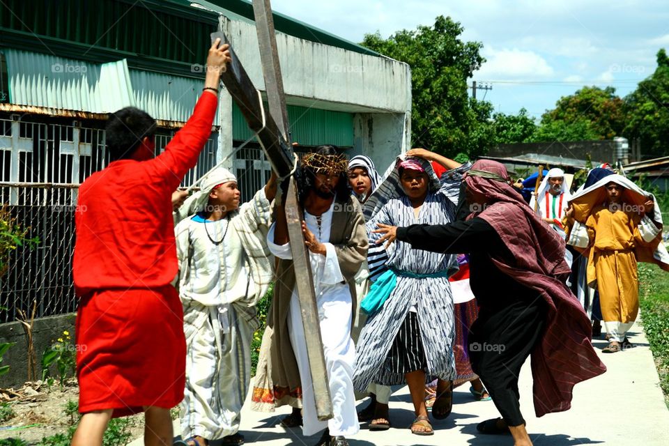 catholic devotees reenact the death of jesus christ on good friday during holy week in cainta, rizal, philippines, asia