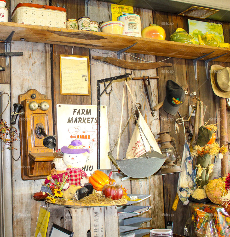 Country farm market display wall of antiques