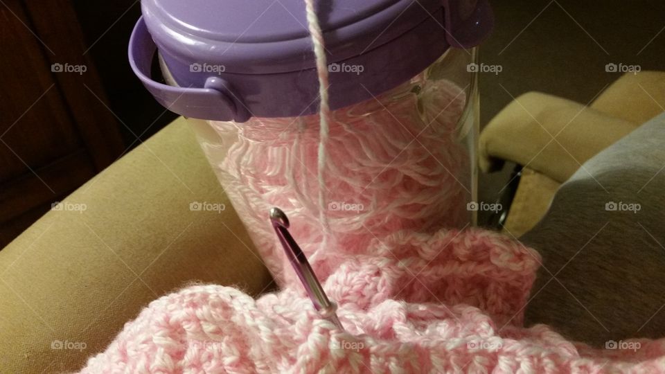 Crochet hook and yarn