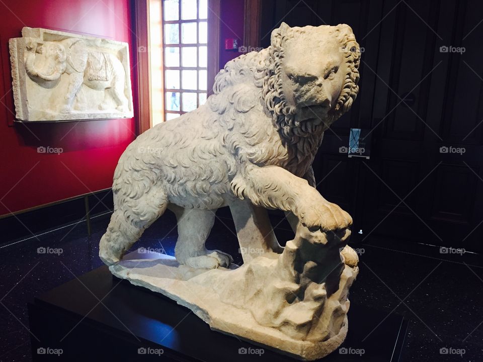 Scarred lion statue