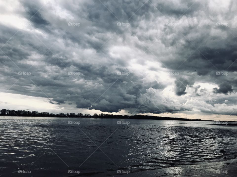 Cloudy sky over the river Elbe - Wedel - Germany 