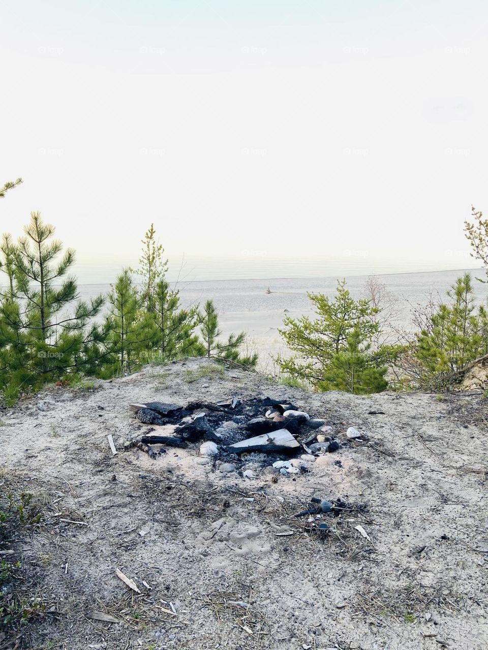 Camp fire ring at a primitive campsite overlooking Lake Superior in Michigan Upper Peninsula 