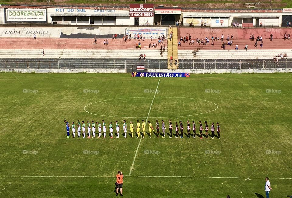 A football match (Soccer) for the third division of the professional championship of the State of São Paulo: Paulista x Rio Preto. / Uma partida de futebol pela terceira divisão do campeonato profissional do Estado de São Paulo: Paulista x Rio Preto.