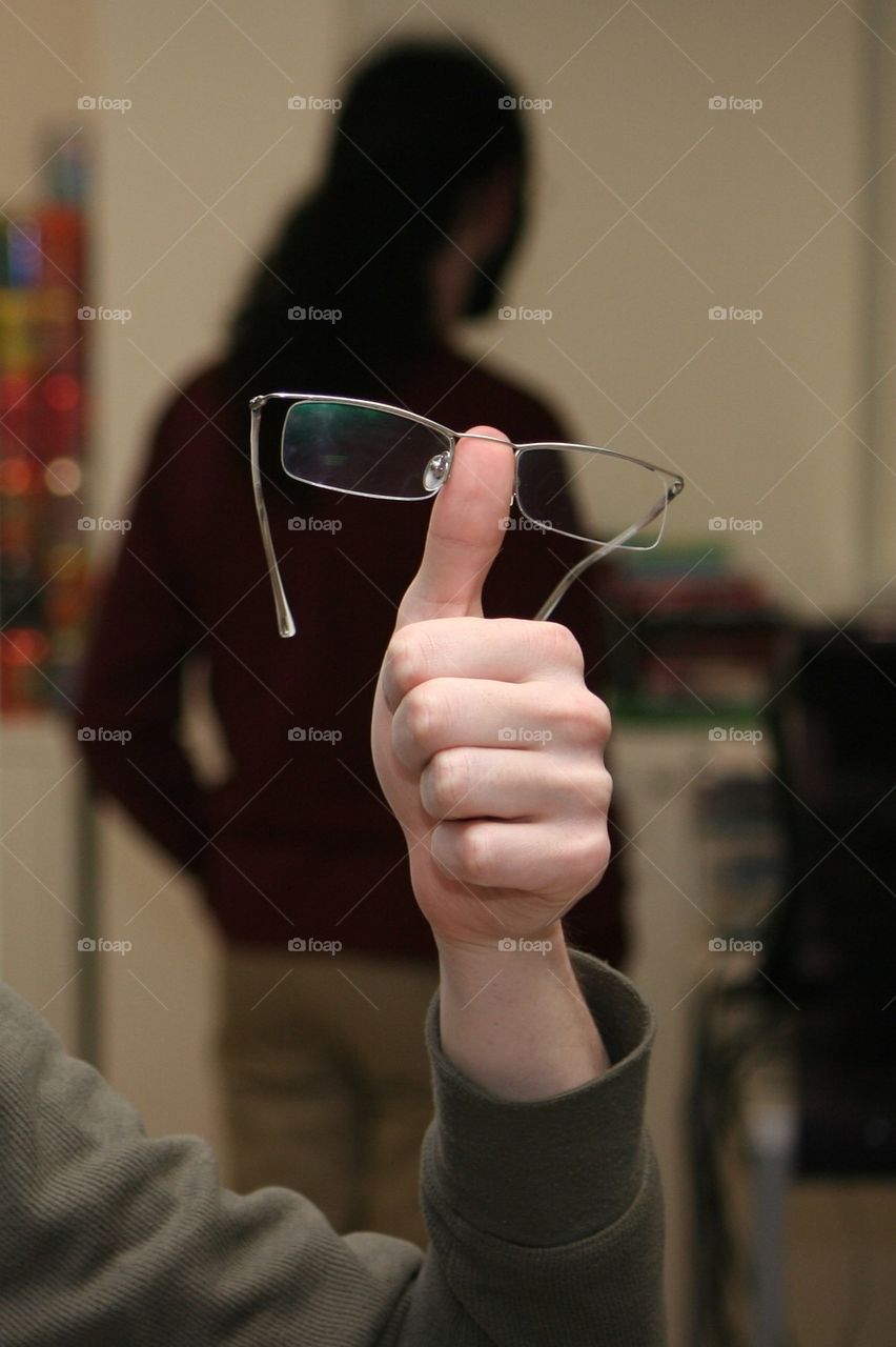 glasses man hand back by serhatb