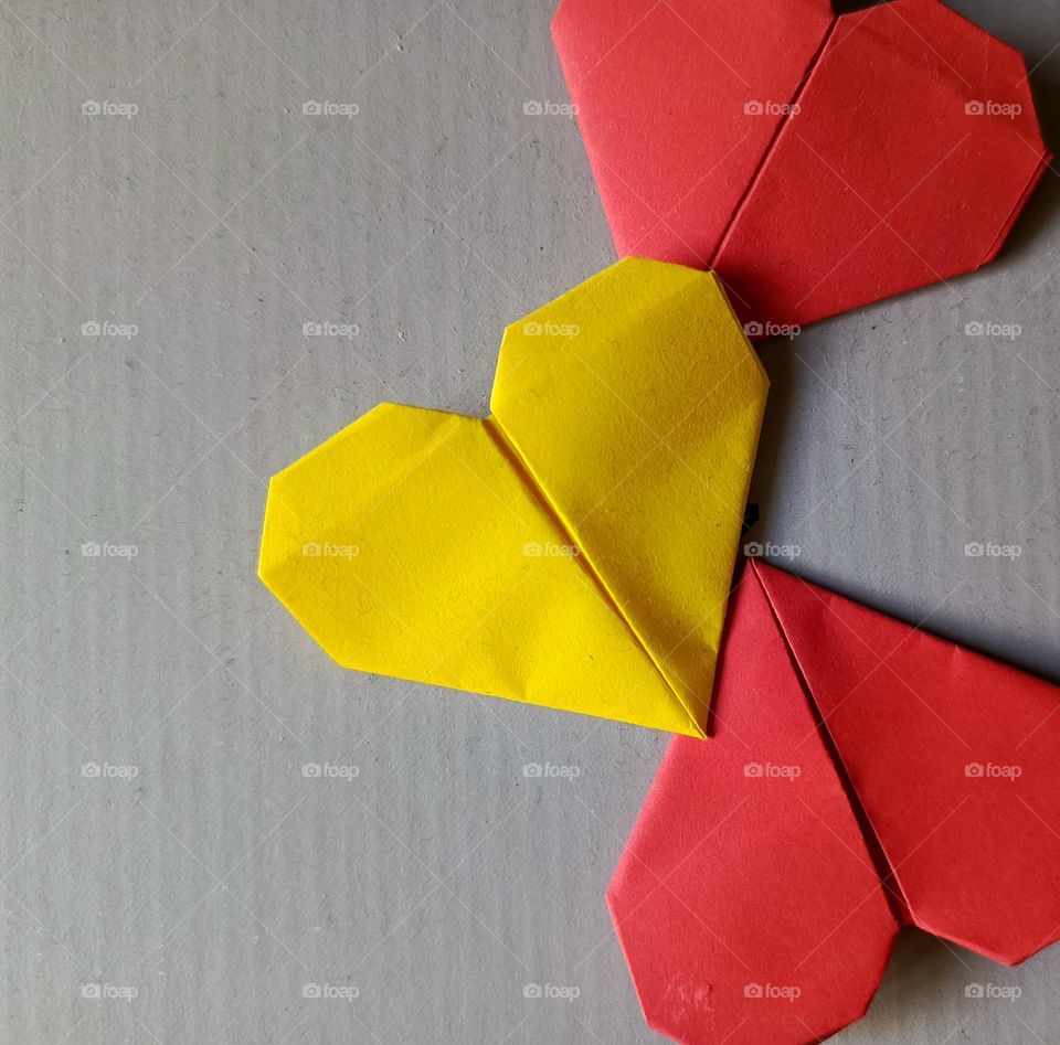 origami love art with grey background
