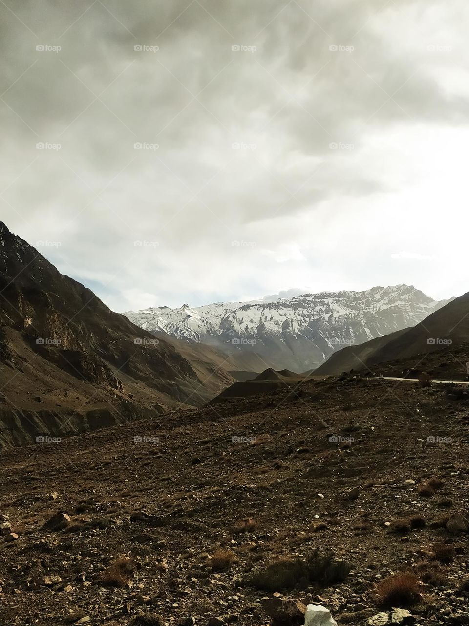 Landscape in the morning with snow covered mountains