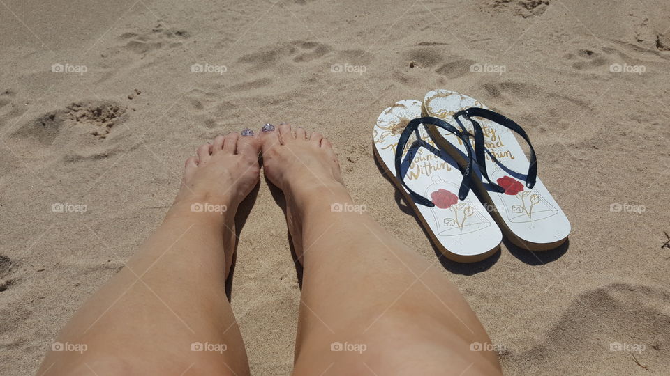 feet in the sand