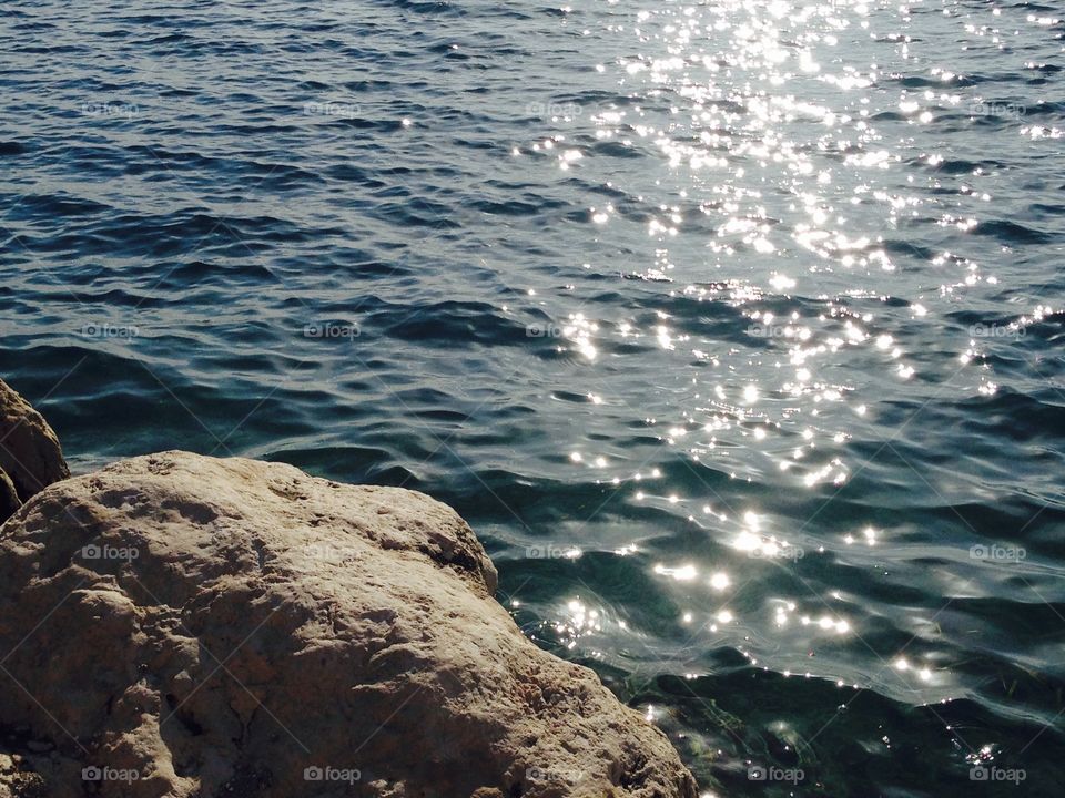 Glittering sunlight on the ocean.