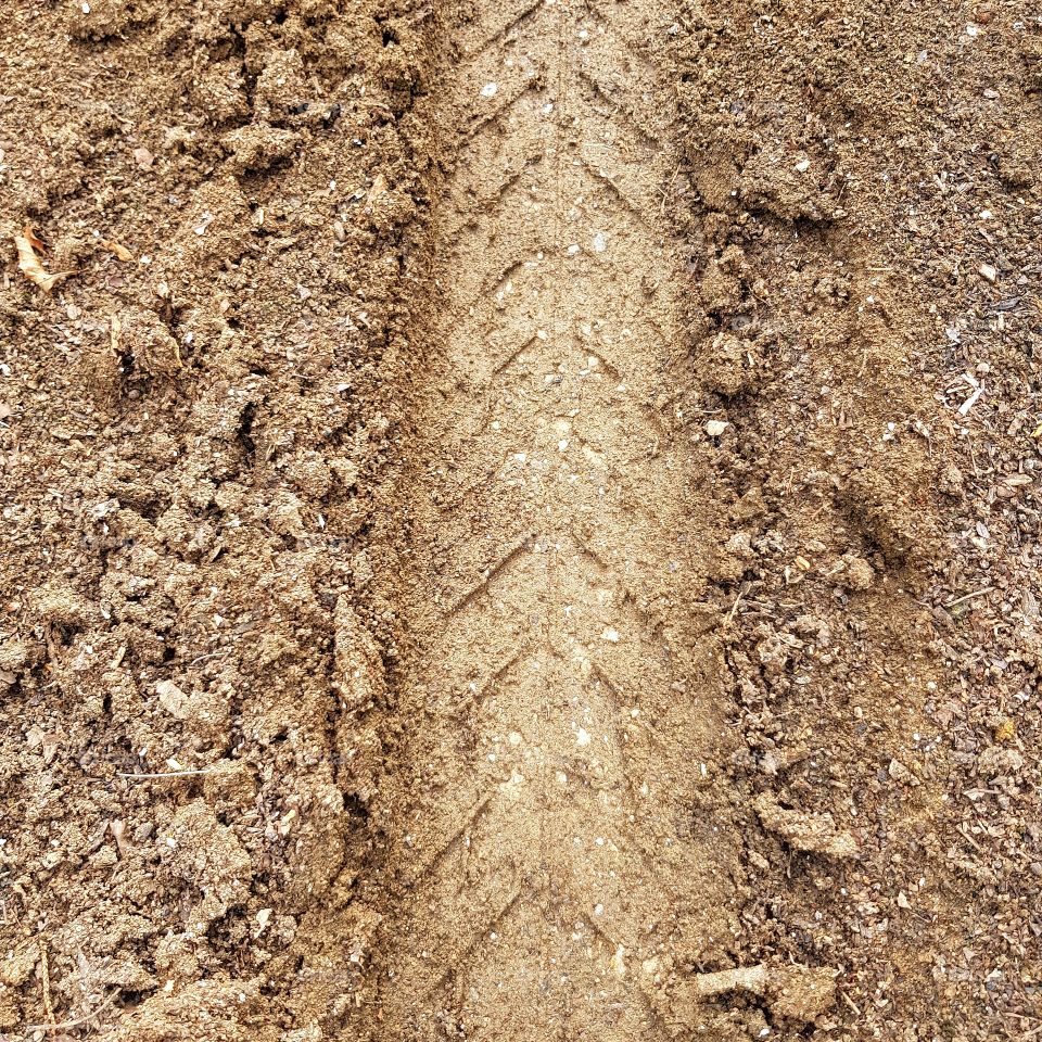 Wheel print on ground